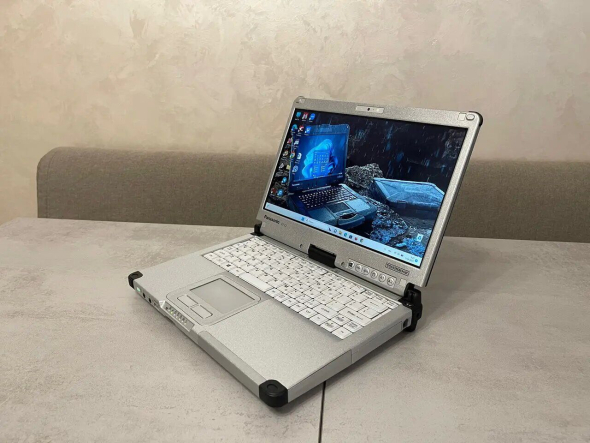 Защищенный ноутбук-трансформер Panasonic ToughBook CF-C2 / 12.5&quot; (1366x768) IPS Touch / Intel Core i5-4300U (2 (4) ядра по 1.9 - 2.9 GHz) / 8 GB DDR3 / 128 GB SSD / Intel HD Graphics 4400 / WebCam / HDMI / 4G LTE - 4